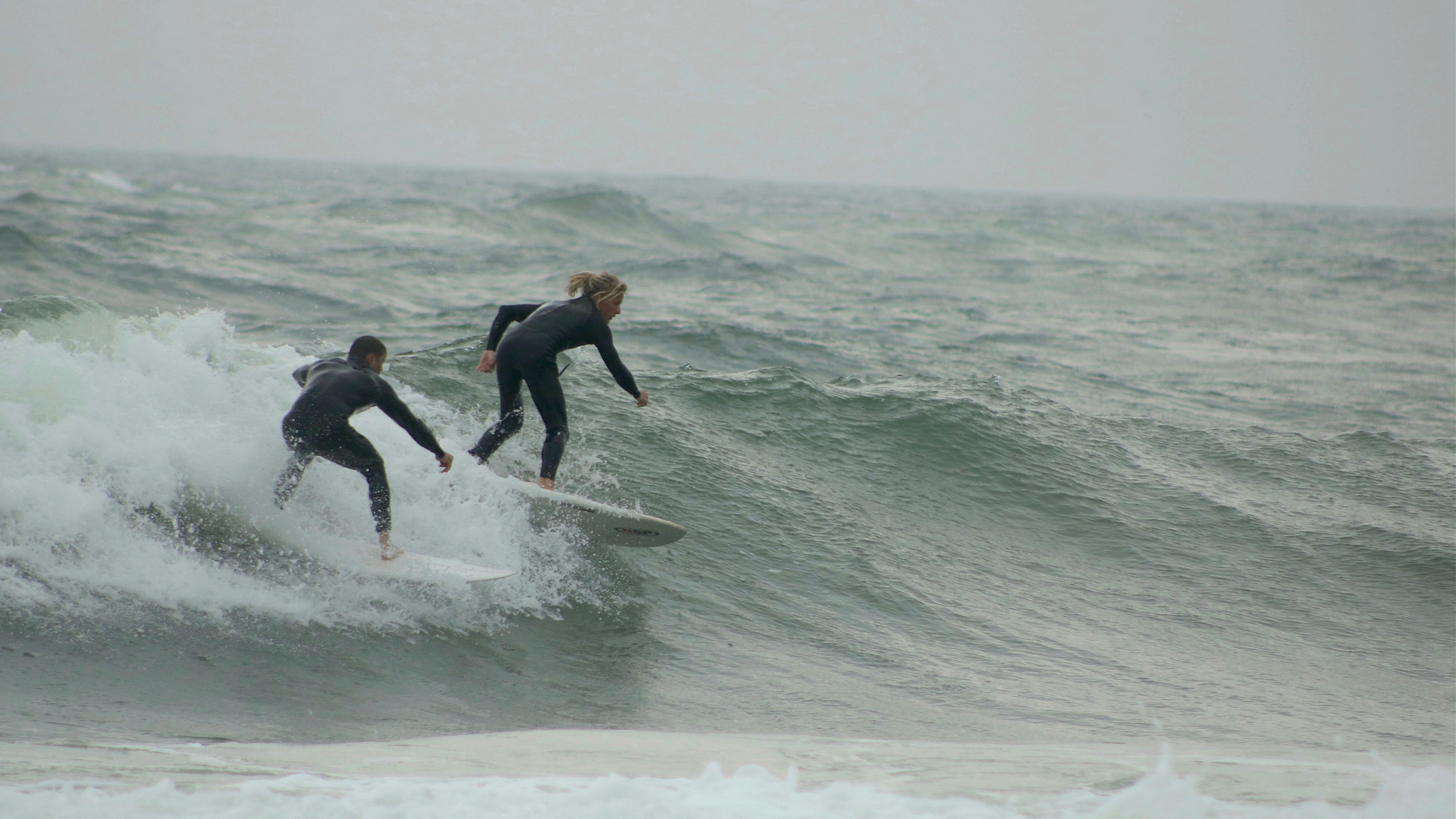 Surfing students on the beach